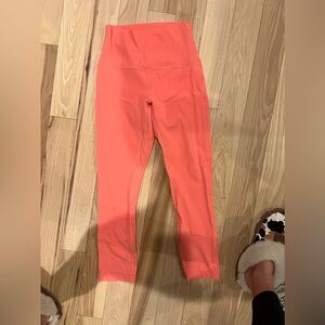 Lululemon Neon orange/peach cropped. Size 4.